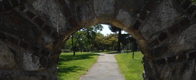 Scenic archway showing pathway on campus
