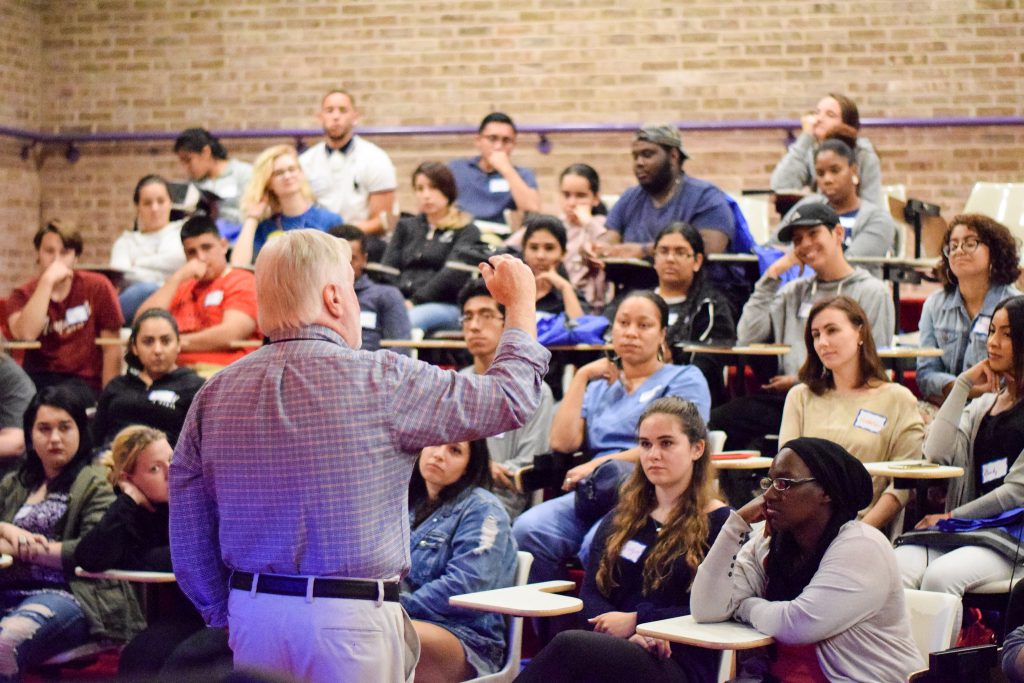 Students at an orientation lecture